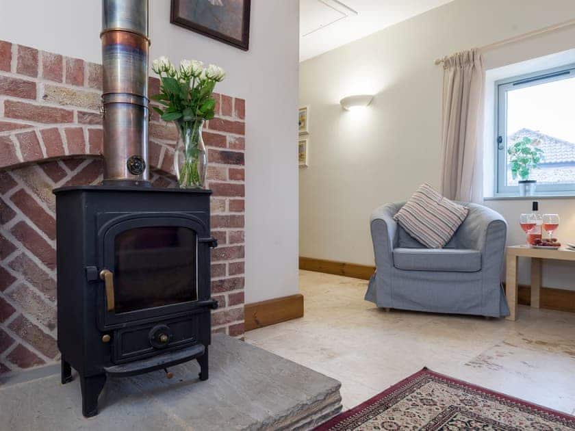 Cosy loving area with wood burner | The Piggery - Manor Mews, Tattersett, near Fakenham