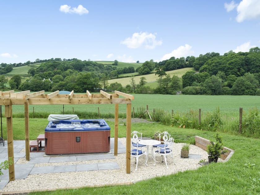 Hot tub | Upper Mill Barn - Pantgwyn Farm Cottages, White Mill, near Carmarthen