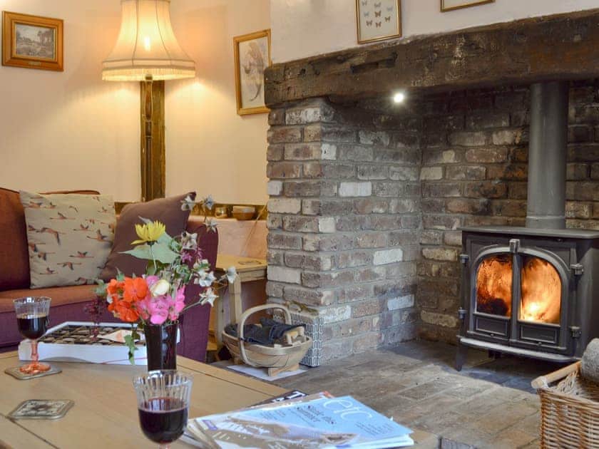Delightful living room with cosy wood burner | Henley Bridge Holiday Cottage, Ashburnham, near Battle