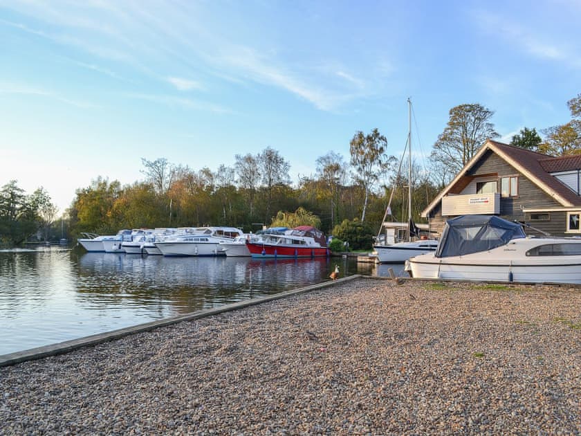 The moorings at Womack Staithe on The Broads, a short stroll away | Woodbine Cottage, Ludham