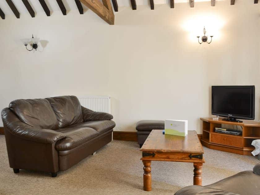 Welcoming living area | Littlewoods Barn - Moor Farm Stable Cottages, Foxley, near Fakenham