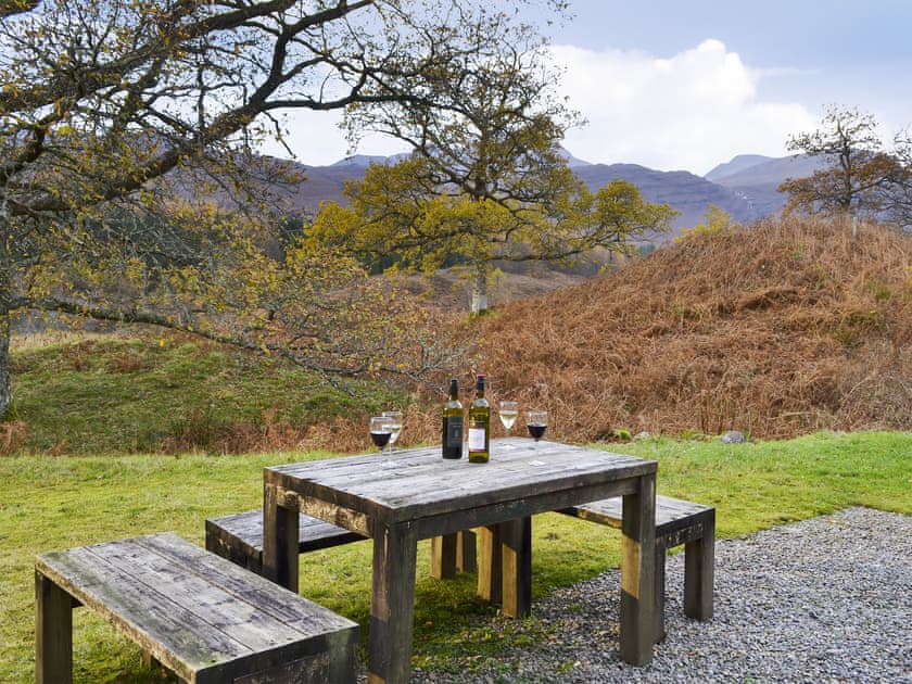 large unfenced rear garden with furniture  | Coulags Croft, Coulags, Strathcarron