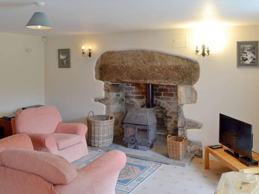 Cosy living room with wood burner | Lukesland Farm Cottage, Harford, Dartmoor National Park