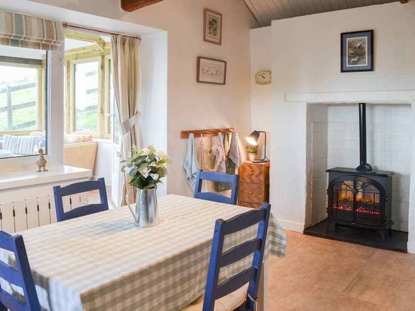 Spacious kitchen/diner with electric ’woodburner’ | West Hurscott Cottage, Hurscott, near Barnstaple