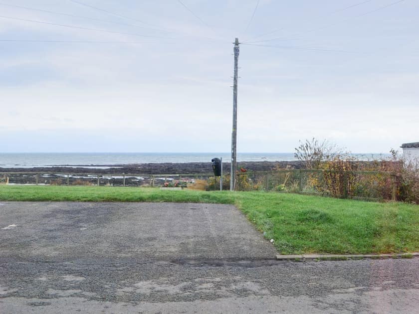 Parking area across from the property | Seal View, Burnmouth, near Eyemouth