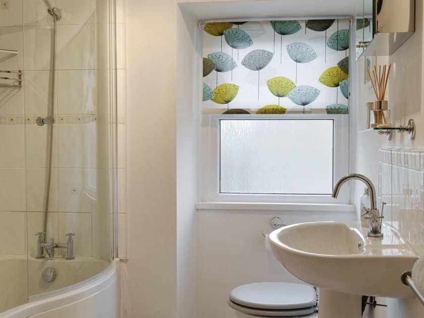 Family bathroom with shower over bath | Curlew Cottage, Gargrave near Skipton