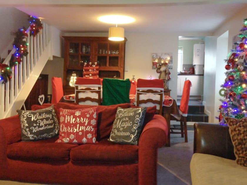 Living room/dining room at Christmas | Penteryfn, near Holyhead, Isle of Anglesey