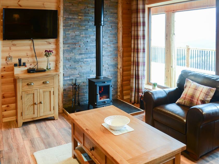 Warm and welcoming living room | Red Kite Lodge, Osprey Lodge, near Dornoch