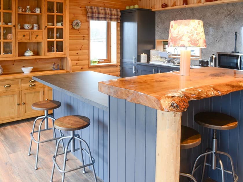 Well appointed kitchen with breakfast bar | Red Kite Lodge, Osprey Lodge, near Dornoch