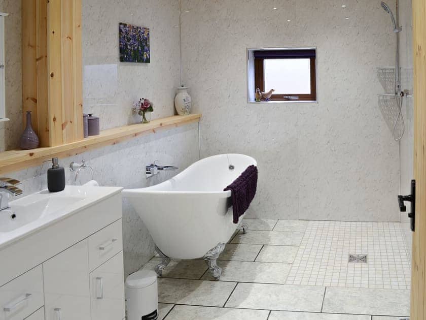 Wet room with roll top bath and walk in shower | Red Kite Lodge, Osprey Lodge, near Dornoch