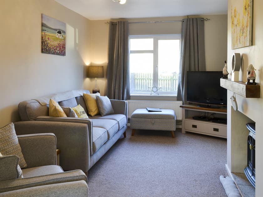 Sitting room with sofa bed | Waggy Tails, Seahouses, near Alnwick