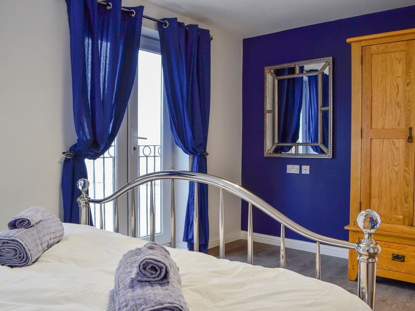 Double bedroom with antique style double bed | Beach View, Aberavon, near Port Talbot