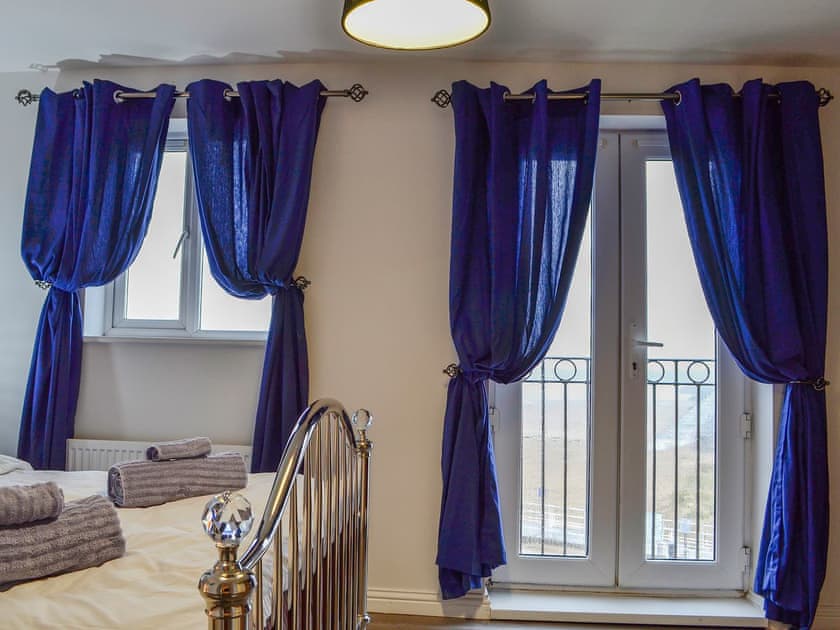 Spacious bedroom with wonderful coastal views | Beach View, Aberavon, near Port Talbot