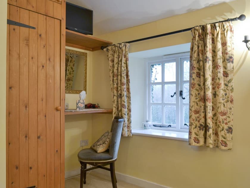 Ample storage and dressing area within the double bedroom | Quarrymans Cottage, Golberdon, near Callington
