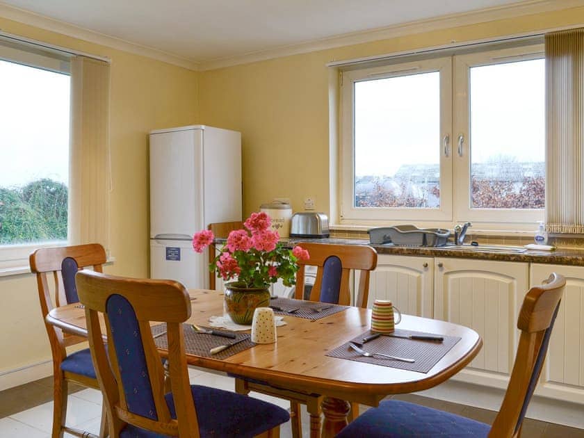 Convenient dining area within kitchen | Sylvan Cottage - Rousland Cottages, Linlithgow