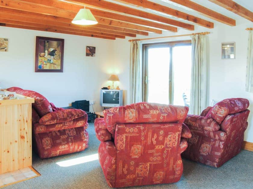 Beamed open plan living area | Porth View - Higher Lanvean Farm, St Mawgan, near Newquay