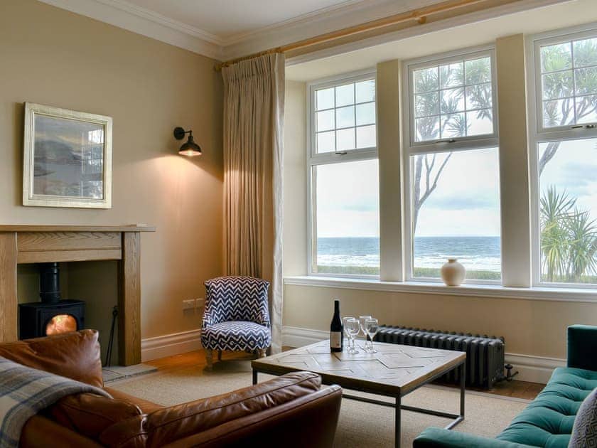 Living room with wood burner and stunning sea views | The Royal Arran, Whiting Bay