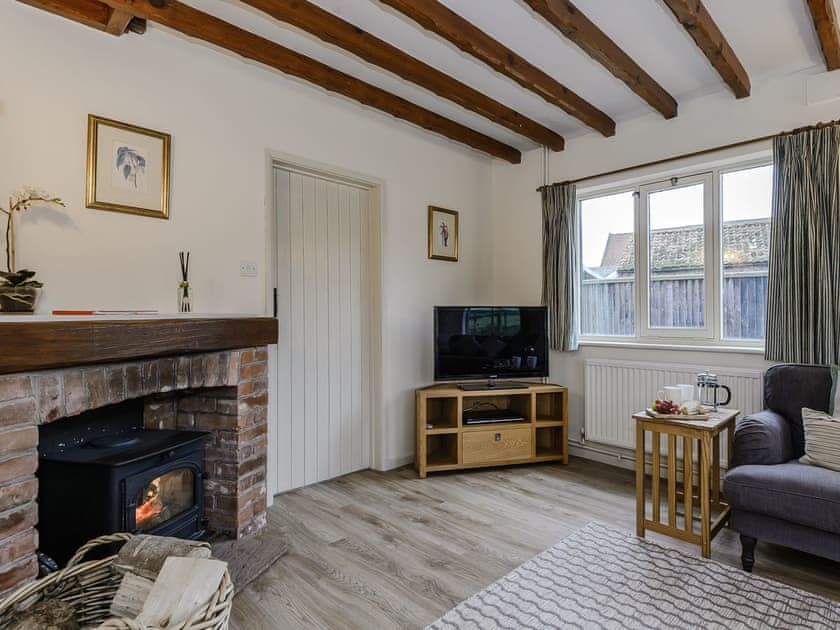 Living room with TV | The Old Saddlery, Colkirk, near Fakenham