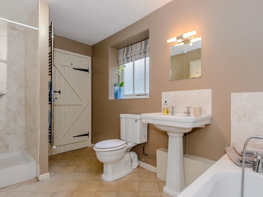 Bathroom with separate shower | The Old Saddlery, Colkirk, near Fakenham