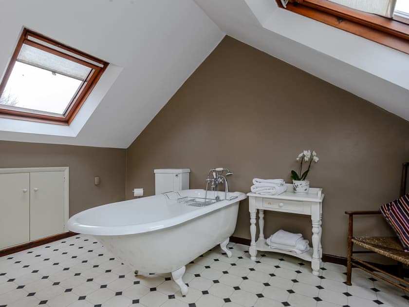 Bathroom with stand alone bath | The Old Saddlery, Colkirk, near Fakenham