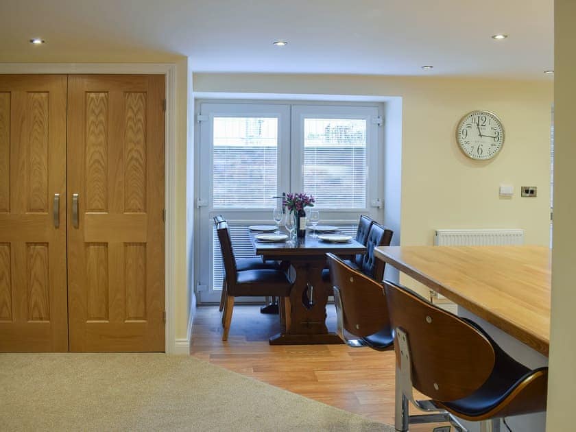 Modest dining area and adjacent kitchen | The Hideaway, Sleights, near Whitby