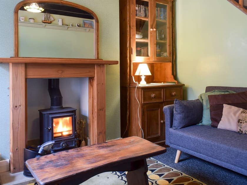 Cosy living room with multi-fuel burner | Flither Cottage, Staithes, near Saltburn-by-the-Sea