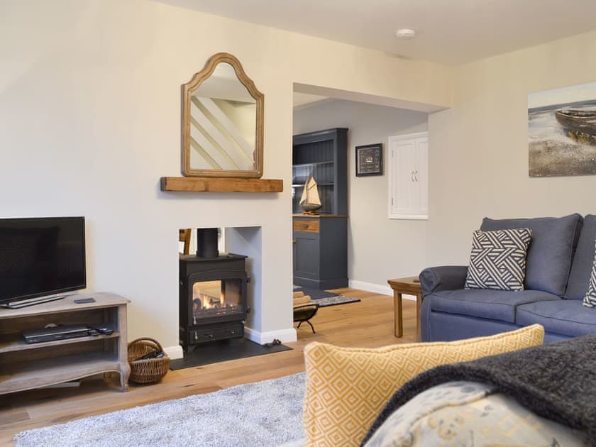 Welcoming living room with wood burner | Treen, Lansallos, near Looe