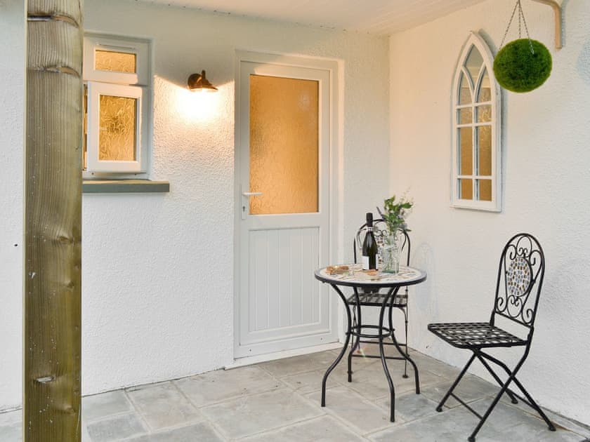 Paved patio area with outdoor furniture | Treen, Lansallos, near Looe