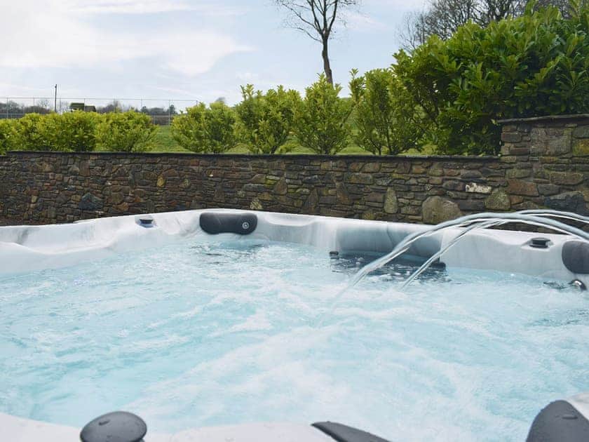 Relaxing hot tub | The Stable - Ffynnonmeredydd Cottages, Mydroilyn, near Aberaeron