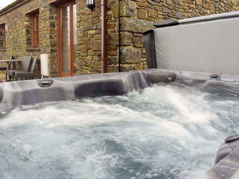 Luxurious hot tub on the patio | Tan Y Dderwen - Ffynnonmeredydd Cottages, Mydroilyn, near Aberaeron