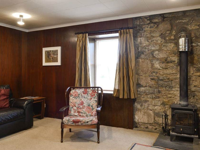 Characterful living room with wood burner | Kirkennan Mews, Palnackie, Castle Douglas