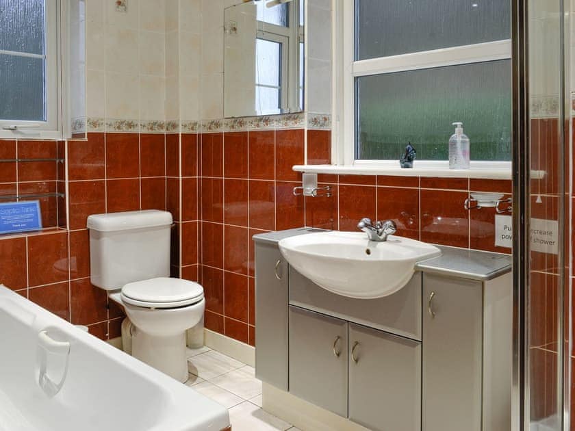 Family bathroom with bath and separate shower cubicle | Kirkennan Lodge, Palnackie, Castle Douglas