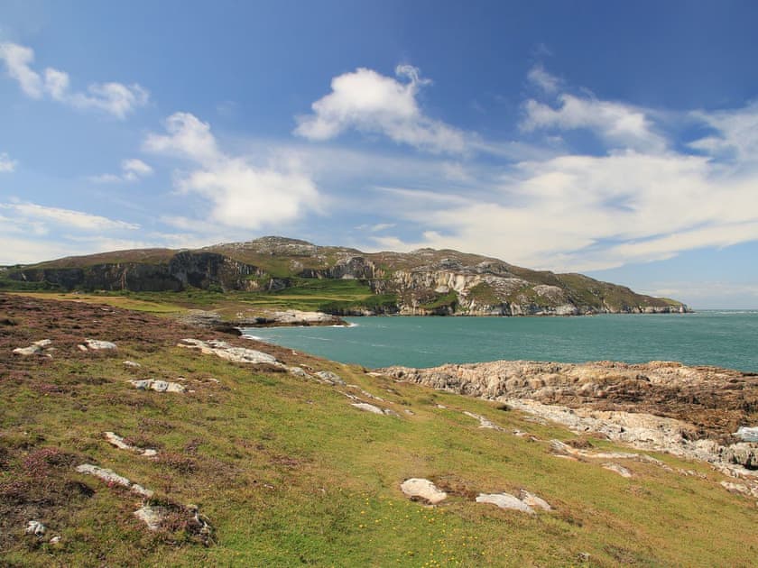View of Holyhead Mountain from Rocky Coast | Fferam Gorniog, Holyhead Mountain, near Trearddur Bay