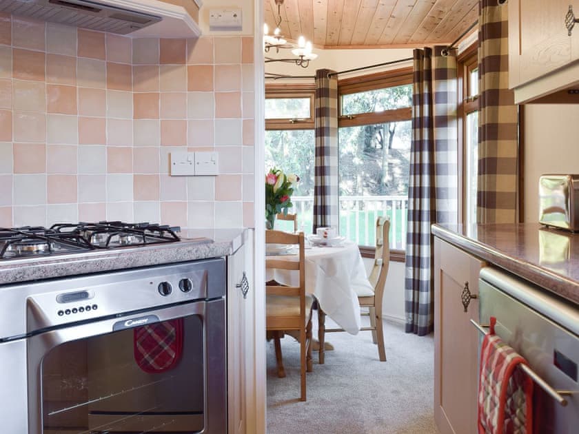 Conveniently situated kitchen | Colman Brook Lodge, Corton, near Lowestoft