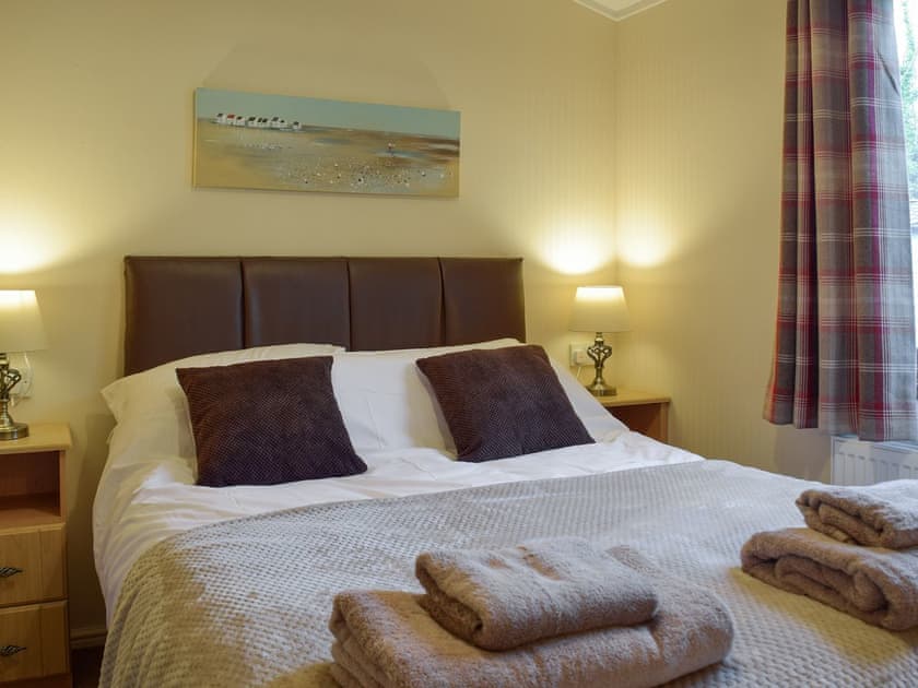 Relaxing en-suite double bedroom | Colman Brook Lodge, Corton, near Lowestoft