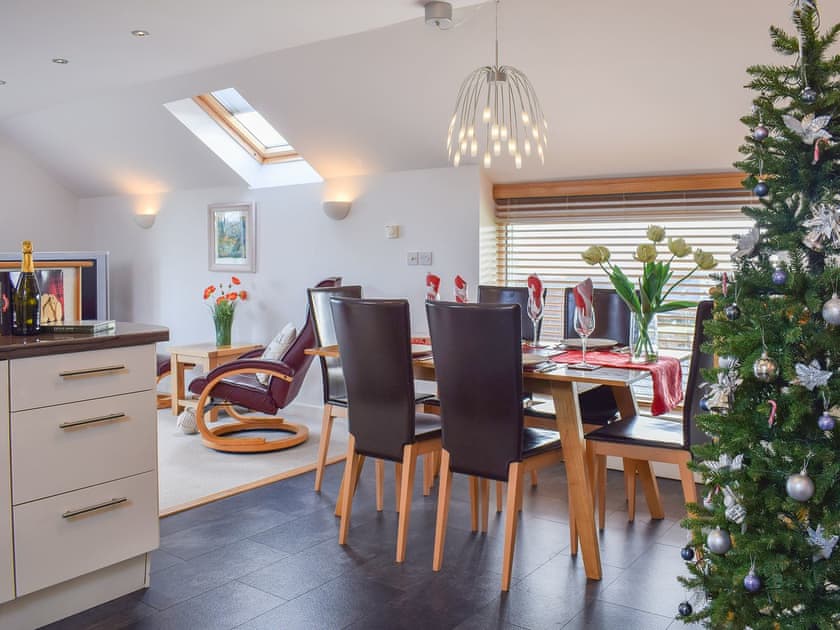 Dining area with seasonal decor | The Plucking Barn, Llanwnnen, near Lampeter