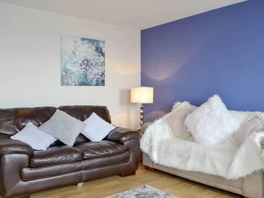 Comfy seating within living room | Beach View, Aberavon, near Port Talbot