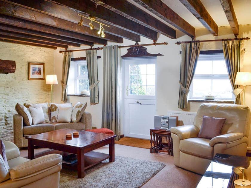 Charming beamed living room | Penny Croft - The Crofters Cottages, Llangeinor, near Bridgend