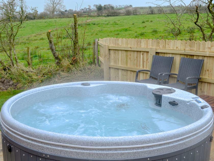Relaxing private hot tub | Skylark Lodge - Wallace Lane Farm Cottages, Brocklebank, near Caldbeck and Uldale
