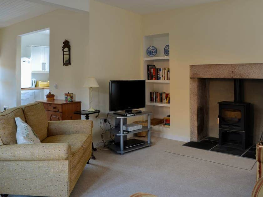 Lovely living room with wood burner | Dairy Cottage, Whitehouse, near Alford