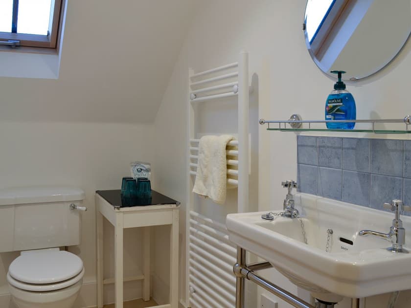 Bathroom with heated towel rail | Dairy Cottage, Whitehouse, near Alford
