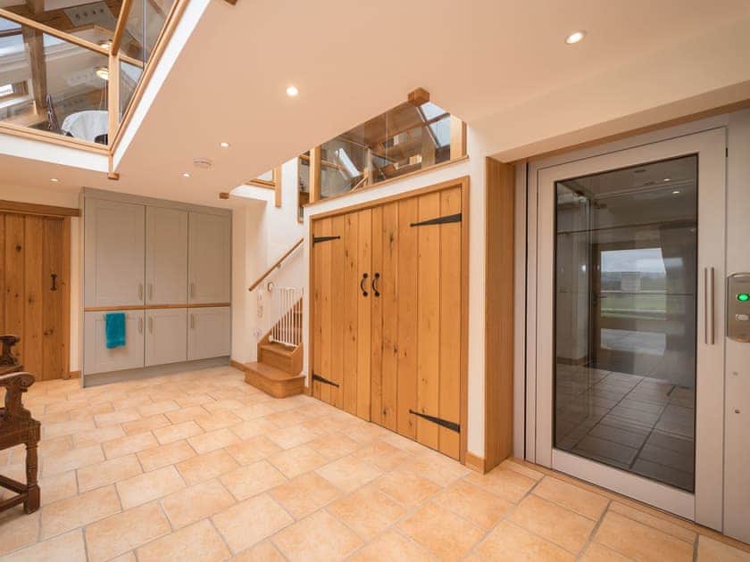 Hallway with lift | Y Beudy, Pwllglas, near Ruthin