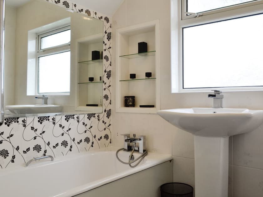 Family bathroom with shower over bath | Middleton Hall, Rhossilli, near Swansea