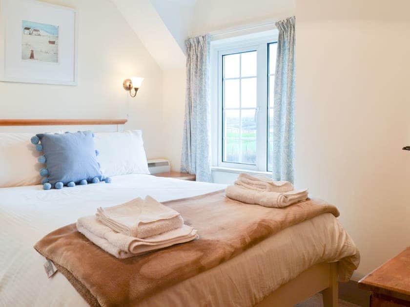 Welcoming double bedroom | St Cadoc Cottage, Harlyn Bay, near Padstow