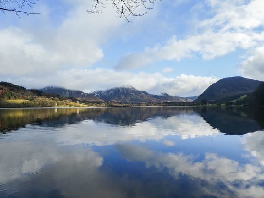 The view across Loweswater towards the cottage with Grasmoor behind | High Thrushbank, Loweswater