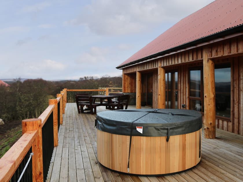 Lovely decked area with hot tub | Osprey Lodge, Rogart, near Dornoch