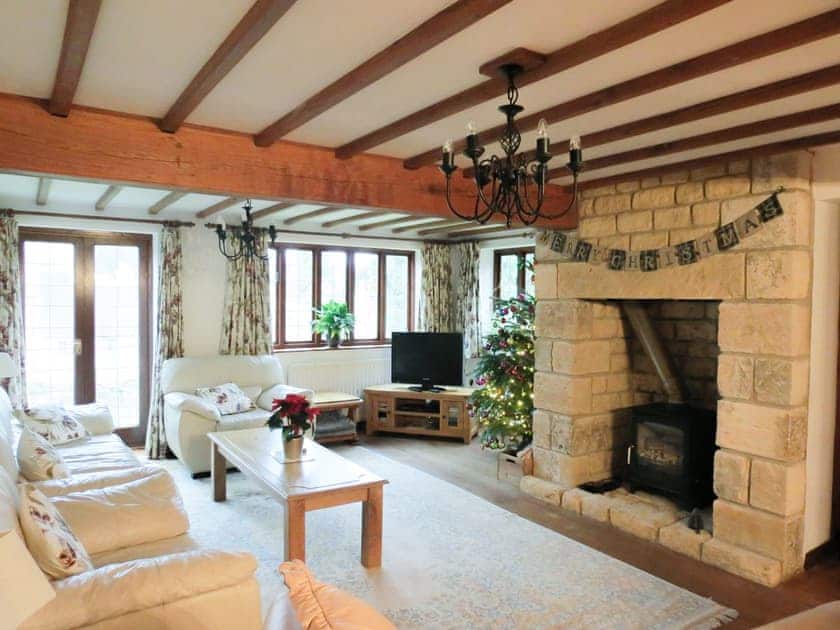 Elegant living room with feature fireplace | Orchard House, Chipping Campden