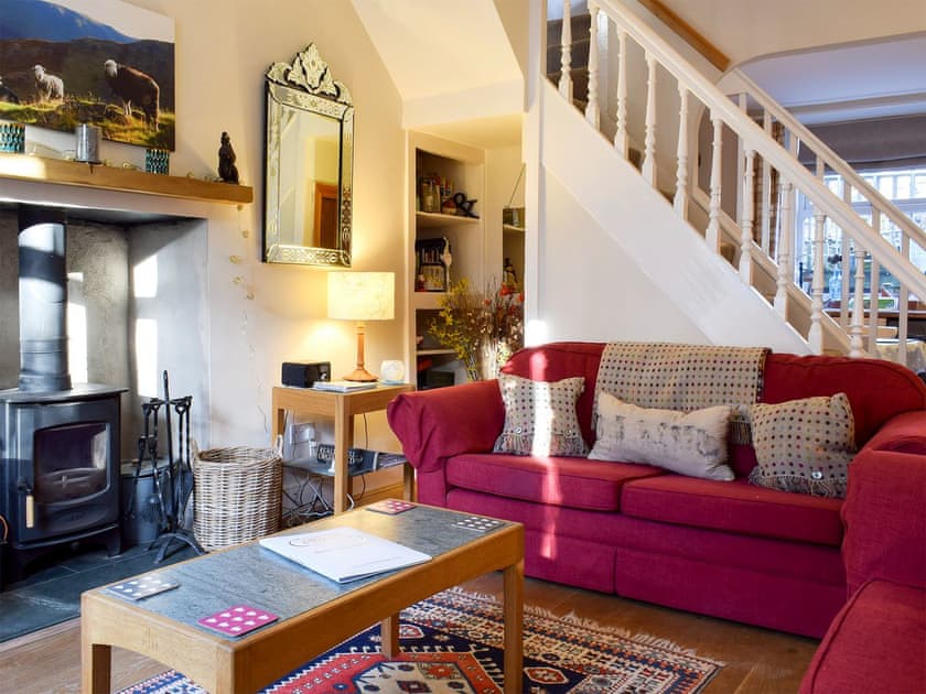 Cosy living area with wood burner | Herdwick Cottage, Troutbeck Bridge