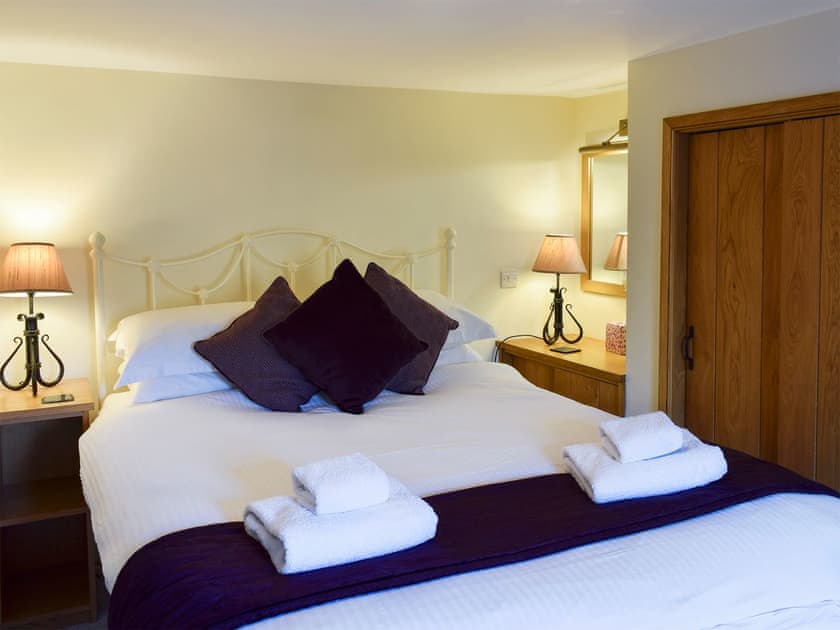 Comfortable bedroom with kingsize bed | A Stone’s Throw Cottage, Ambleside