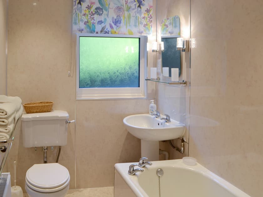 Family bathroom with shower over bath | Rowan Cottage - Whitelee Farm, Bryness, near Otterburn